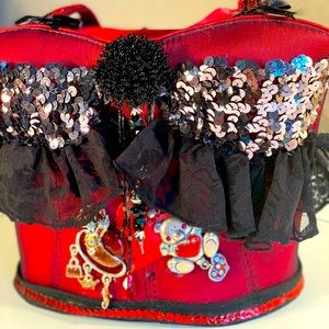 Caravelle red and black bustier purse
